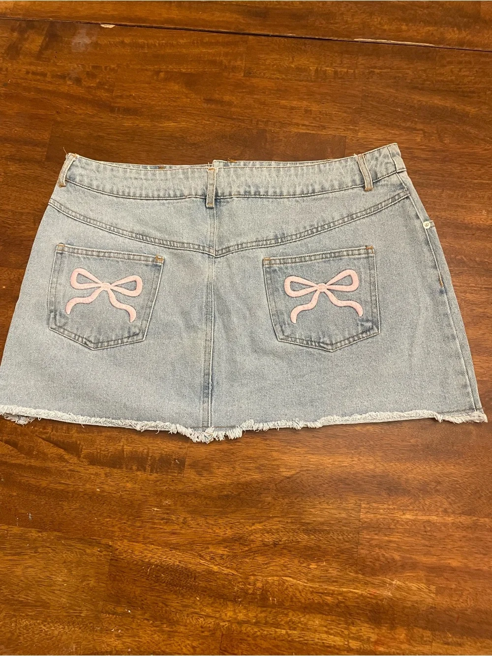Altar’d State Denim Mini Skirt Women’s XL Light Wash Raw Hem Pink Bow Pockets